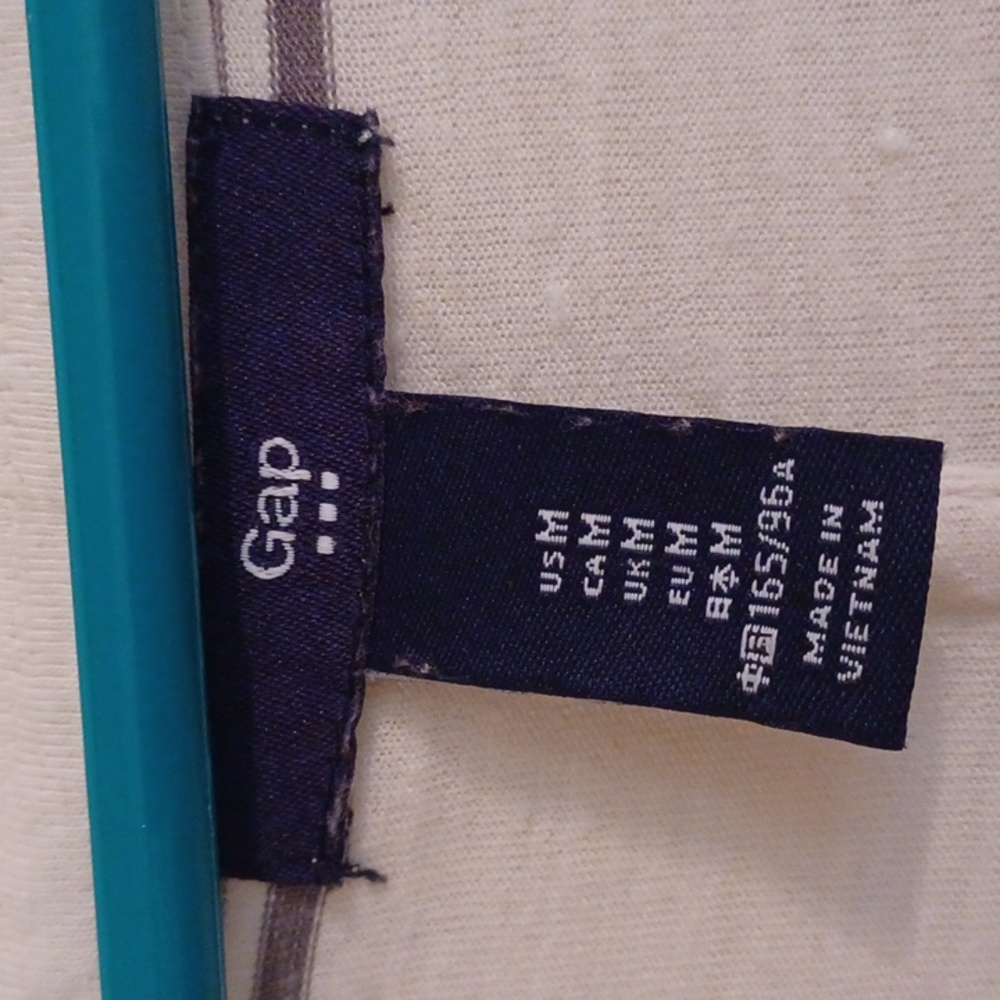 Gap knit, long sleeved dress, size M, with draw string just below waist.